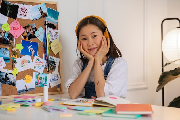 Woman creating their own vision board