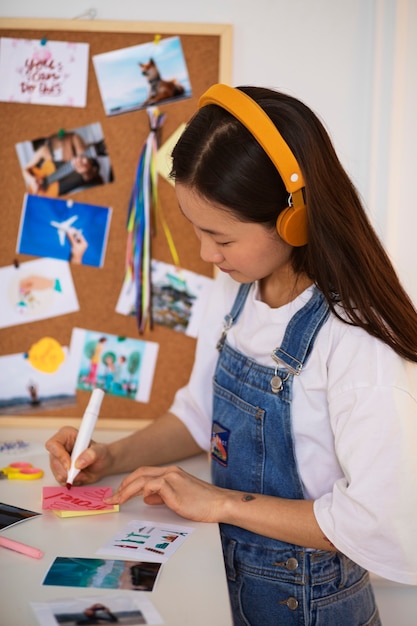 Free photo woman creating their own vision board