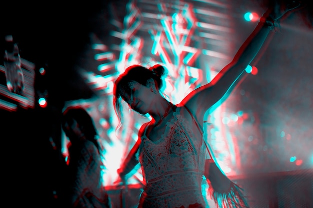 Free Photo woman dancing in a music festival in double color exposure effect