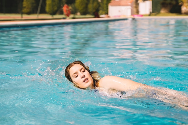 Woman doing front crawl swimming