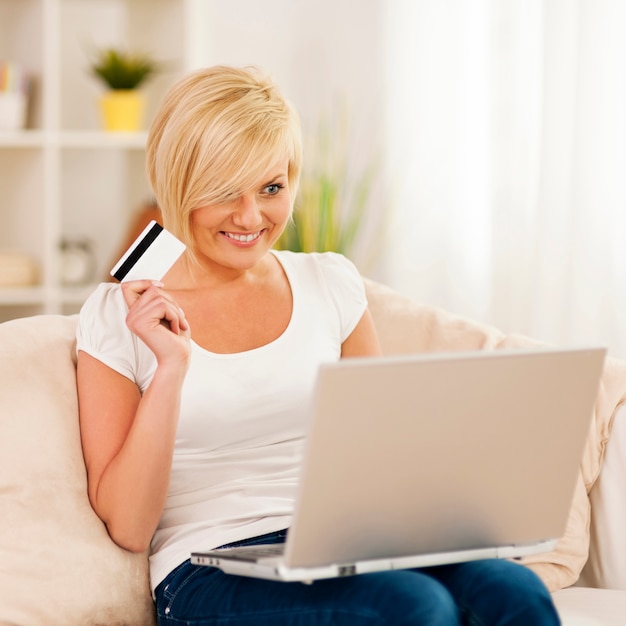 woman doing Online shopping on her laptop