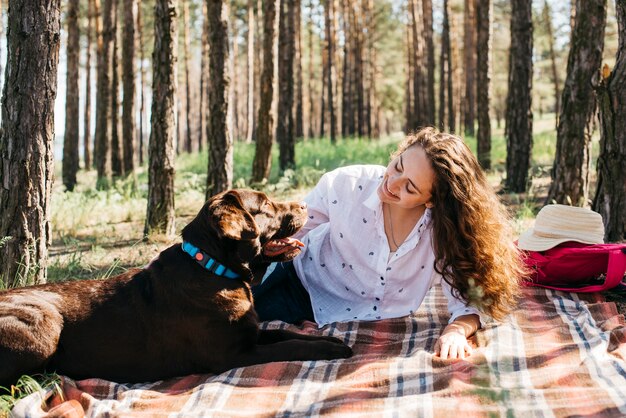 Woman doing a picnic with her dog