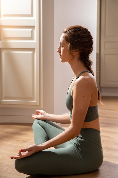 Woman doing yoga for cleaning chakra