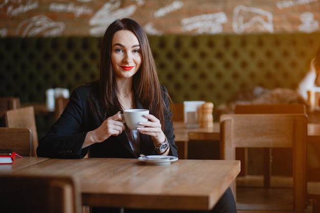 Woman drink a coffee