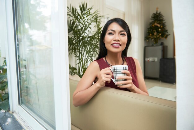 Woman drinking coffee