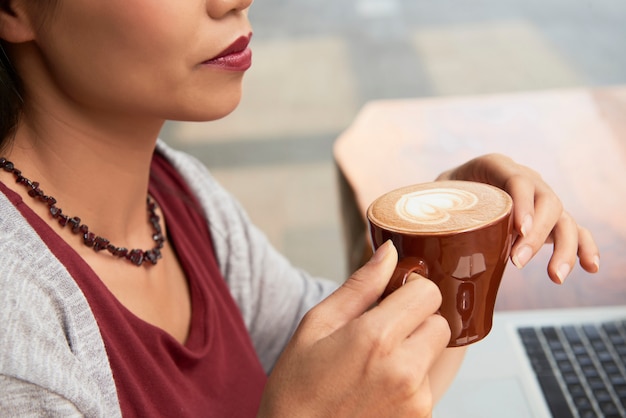 Woman drinking coffee