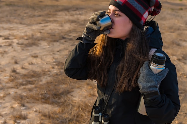 Free photo woman drinking hot tea.