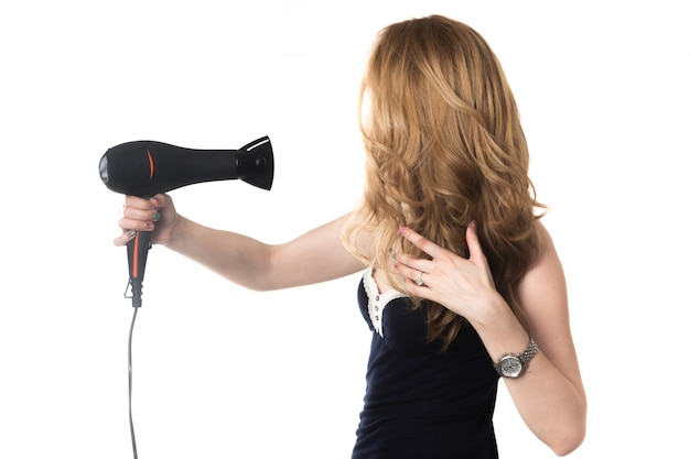 Woman drying her hair