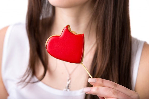 Free Photo woman eating a heart