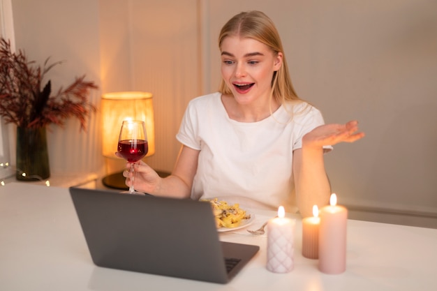 Free photo woman eating pasta at home medium shot