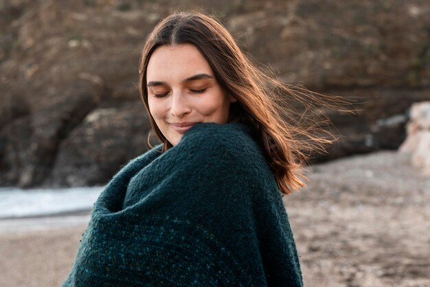 Free photo woman enjoying a beach excursion