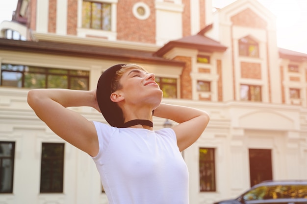 Woman enjoying a beautiful day in the city