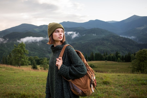 Free Photo woman enjoying the beautiful rural surroundings