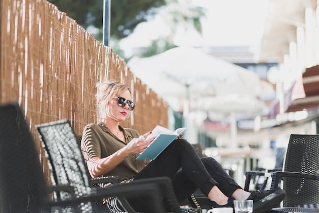 Woman enjoying book on vacation