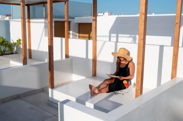 Woman enjoying a book while traveling