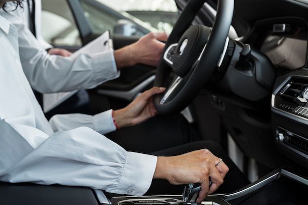 Woman enjoying her financially independence while buying car