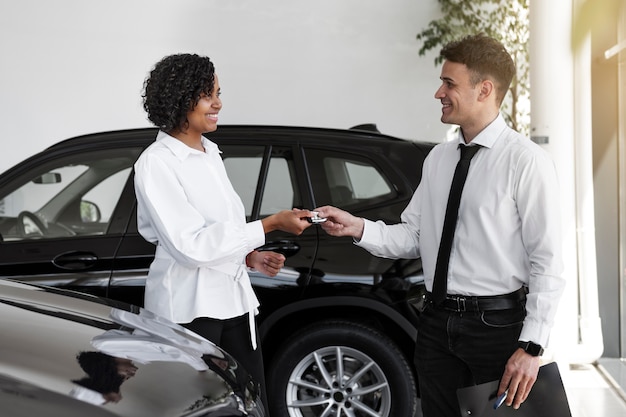 Woman enjoying her financially independence while buying car