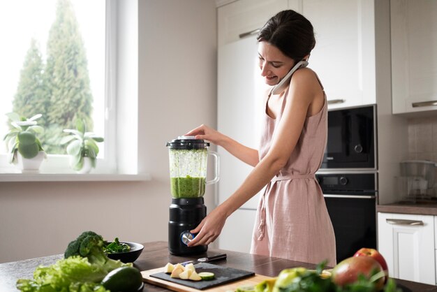 Woman enjoying her juice recipe