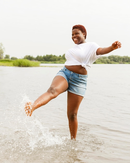 Woman enjoying herself at the beach