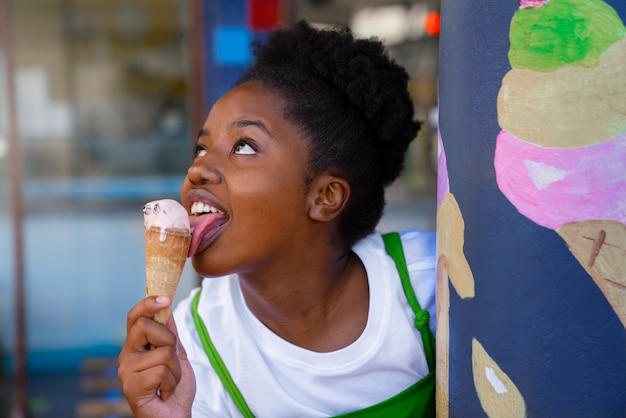 Woman enjoying ice cream outdoors