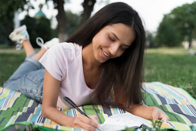 Woman enjoying a sudoku game alone