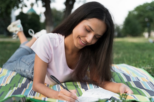 Woman enjoying a sudoku game alone