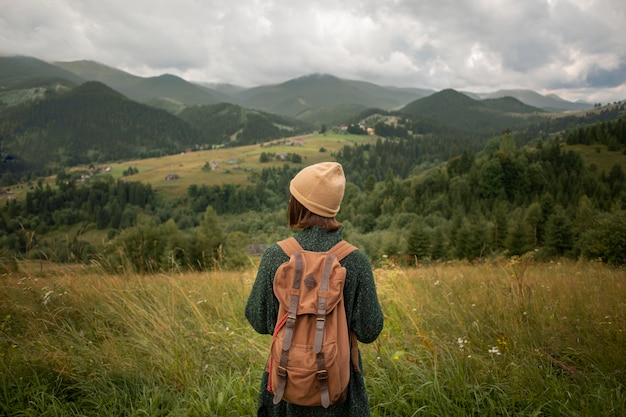 Woman exploring beautiful rural surroundings