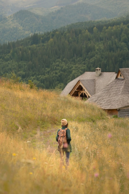 Free Photo woman exploring beautiful rural surroundings