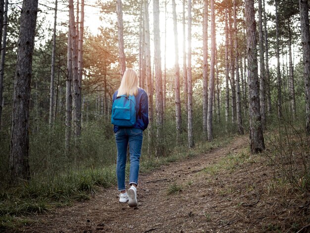 Woman exploring forest