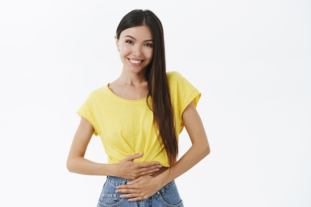 Free photo woman feeling healthy and pleased. delighted good-looking female with beautiful smile gazing