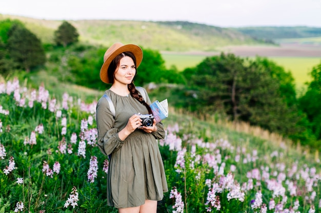 Woman on field with camera