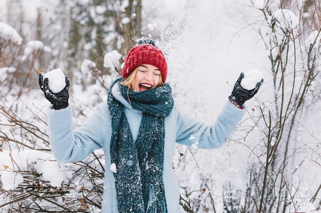 Woman in flying snow