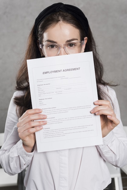 Free Photo woman from human resources holding contract