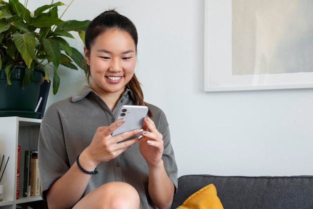 Woman in front of her phone