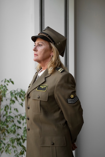 Free photo woman general in uniform medium shot