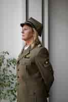 Free photo woman general in uniform medium shot