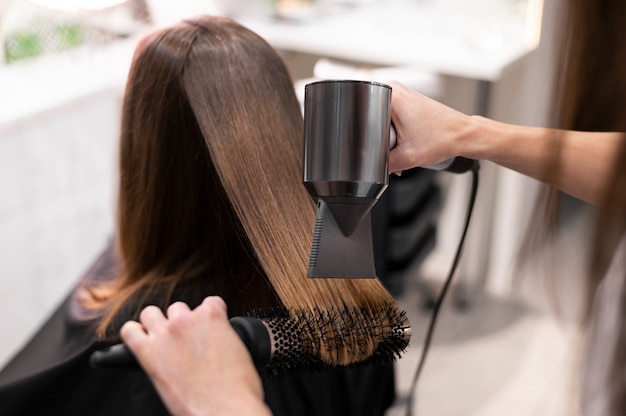 Woman getting her hair done at the beauty salon