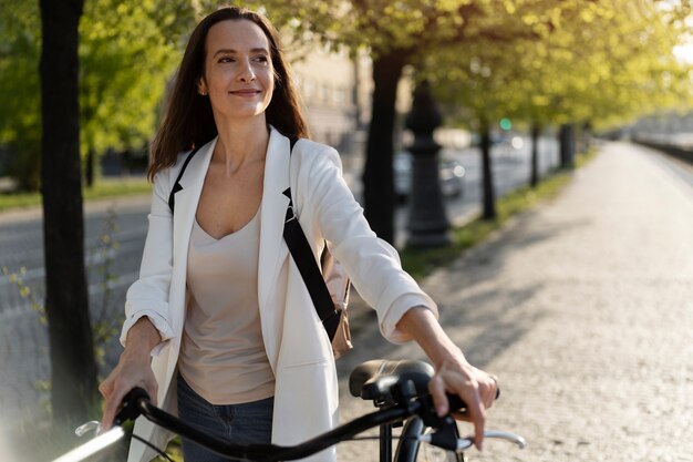 Woman going to work on bicycle