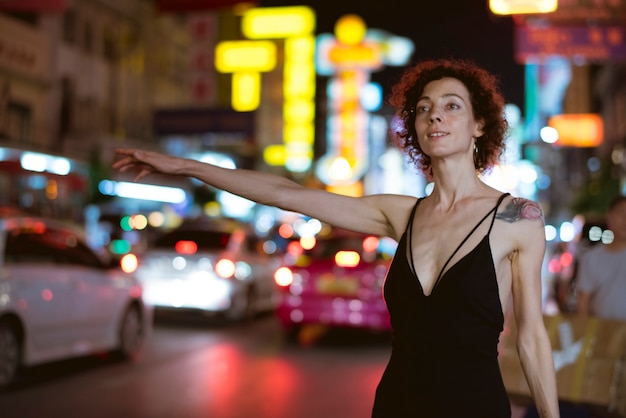 Free Photo woman hailing a cab