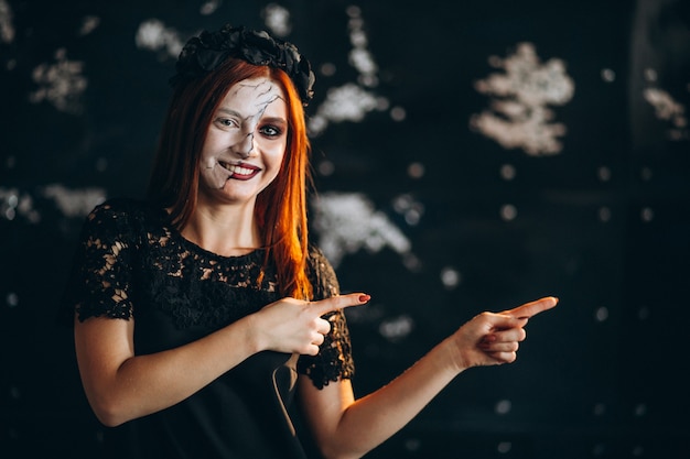 Free photo woman in a halloween costume