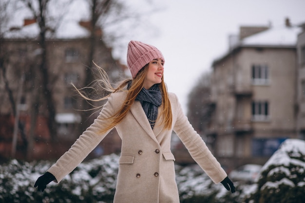 Woman happy in a winter park