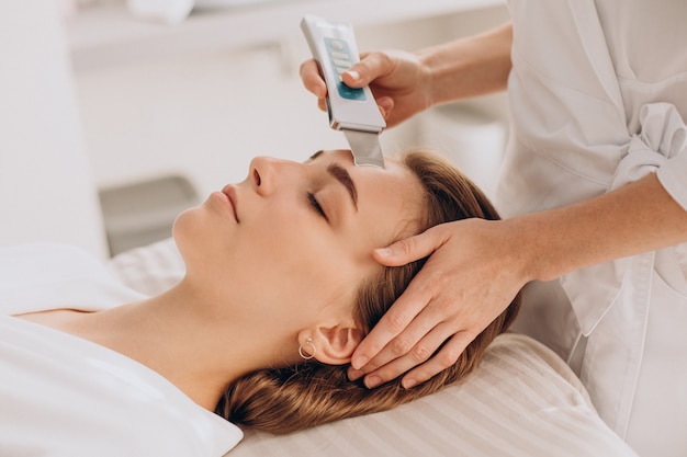 Woman having beauty treatment procedures in a salon