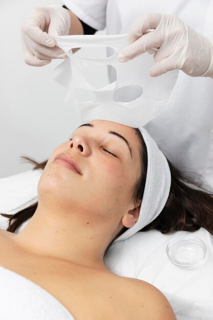 Woman having a facial skincare treatment