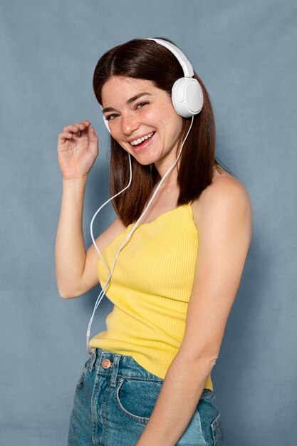 Woman having fun wearing headphones