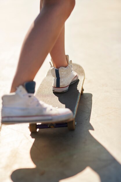 Woman having fun with skateboarding