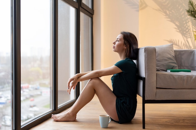 Woman having some alone time at home