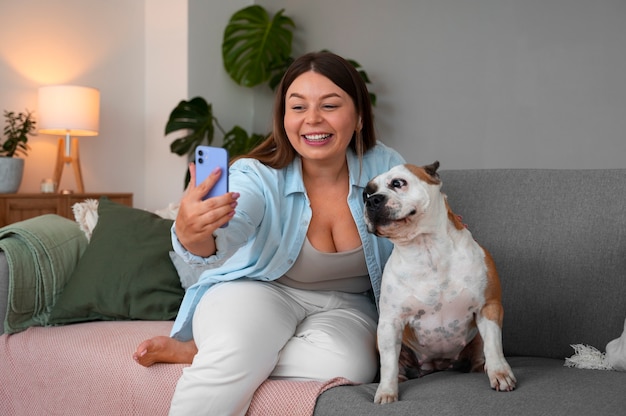 Woman having a video call at home with a smartphone device