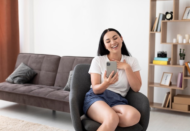 Woman having a videocall with her family