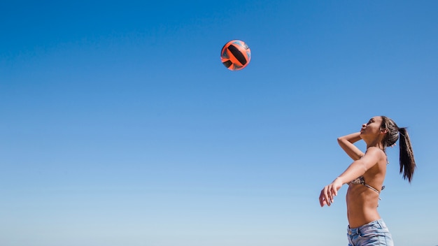 Woman hitting volleyball