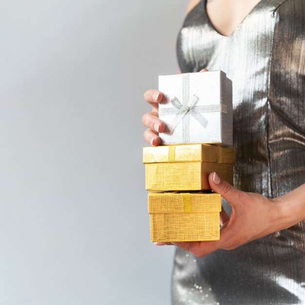 Woman holding black friday gifts